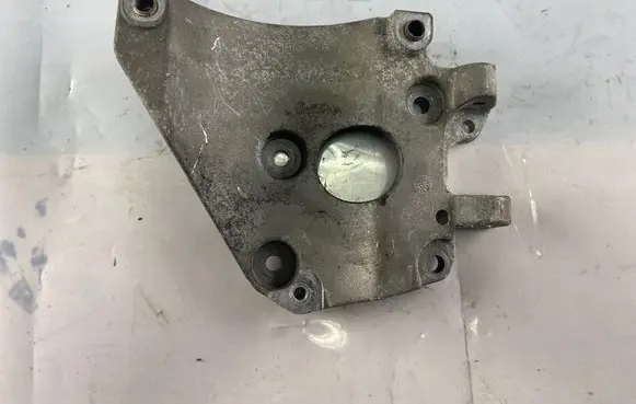 Volvo V40 A/C compressor mount bracket Av6q10k360aa