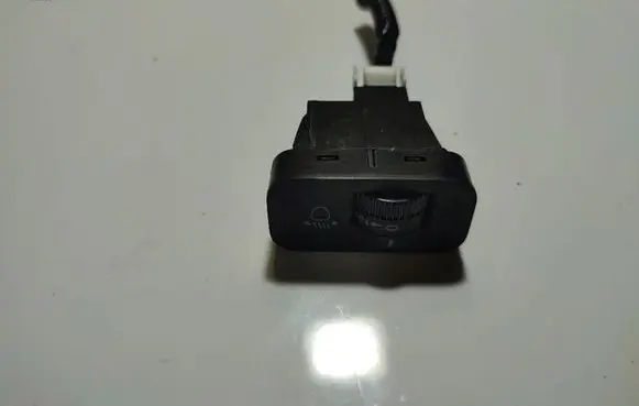 Headlight level height control switch