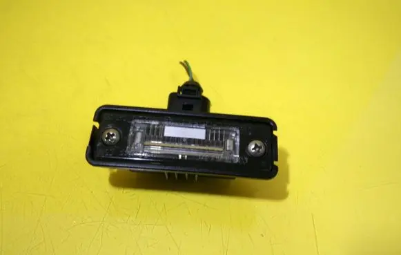 Volkswagen Golf IV Number plate light 1J6943021