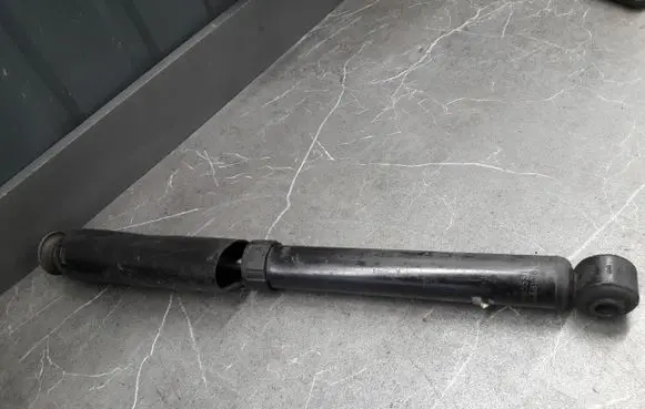 Opel Astra H Front shock absorber/damper 24438108