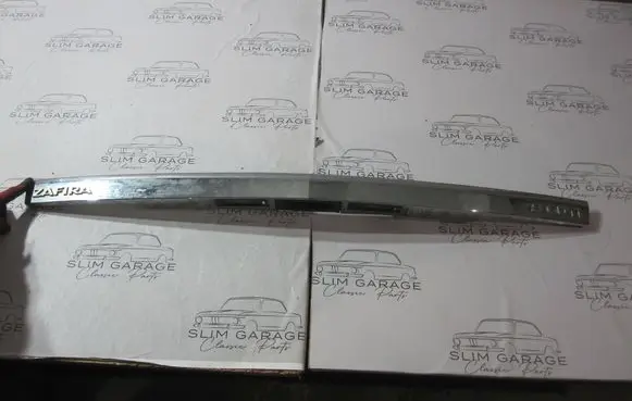 Opel Zafira B Trunk door license plate light bar 13137862 316053479