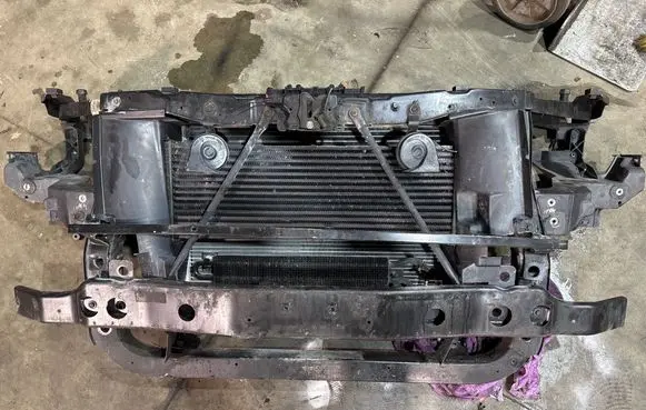 Radiator support slam panel