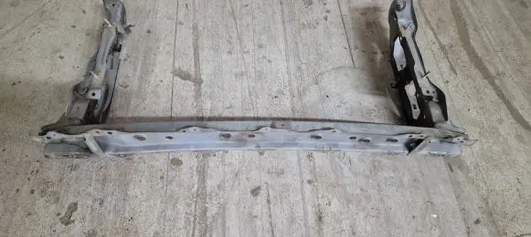Top upper radiator support slam panel