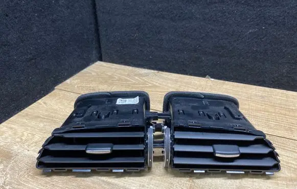 Jaguar XE Dash center air vent grill GX73014L21BF 09467