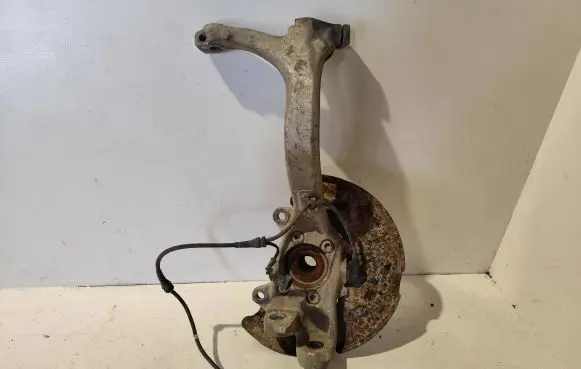 Front wheel hub spindle knuckle