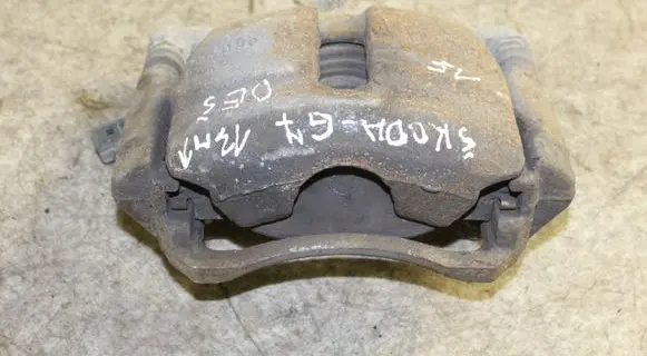 Volkswagen Golf VII Front brake caliper