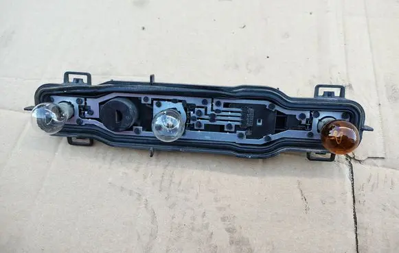 Renault Kangoo II Tail light bulb cover holder 
