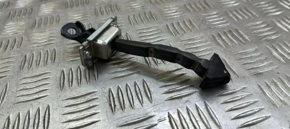 Mazda 3 II Rear door check strap stopper