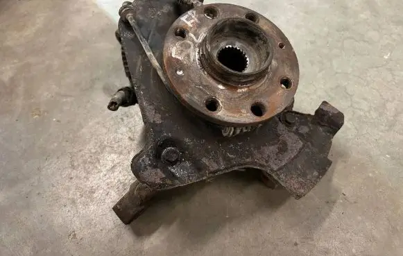 Opel Corsa D Front wheel hub spindle knuckle