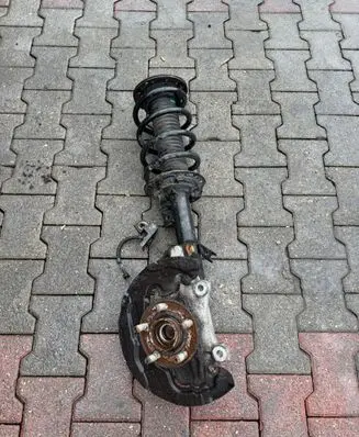 Front shock absorber with coil spring