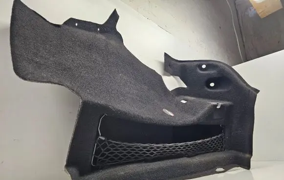 Trunk/boot side trim panel