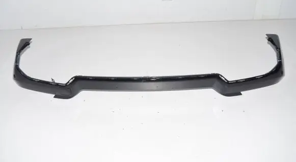 Rear bumper trim bar molding