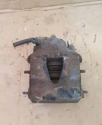 Volkswagen Golf V Front brake caliper