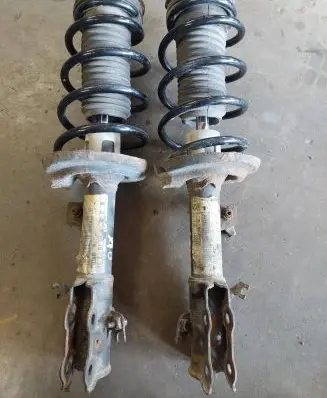 Front shock absorber with coil spring