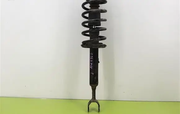 Volkswagen PASSAT B5 Front shock absorber with coil spring