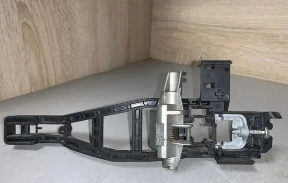 Rear door exterior handle/bracket