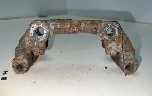 Saab 9-3 Ver2 Brake caliper pad carrier rear 