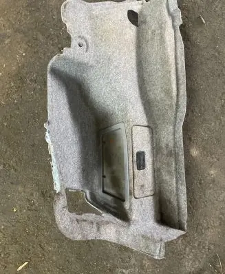 Trunk/boot lower side trim panel