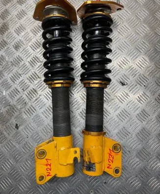 Subaru Legacy Front shock absorber with coil spring