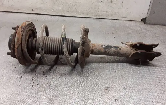 Nissan X-Trail T30 Front shock absorber with coil spring 