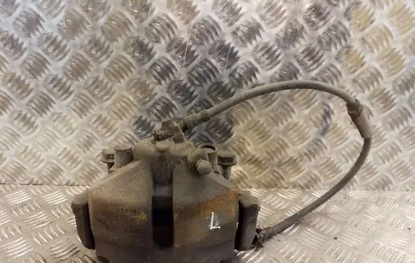 Volkswagen Jetta VI Front brake caliper