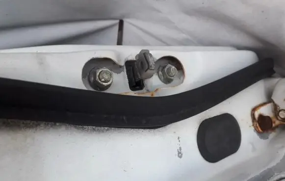 Mazda 626 Front door check strap stopper 