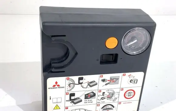 Mitsubishi Colt Tire air pump compressor 4269A041