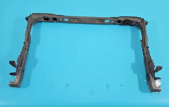 Radiator support slam panel