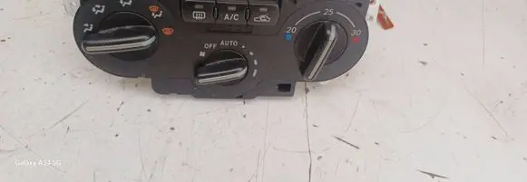 Subaru Impreza II Climate control unit 72311FE051 3B60234700