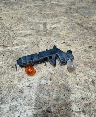 Volvo 850 Tail light bulb cover holder 9161646