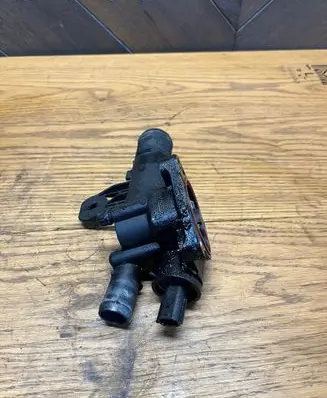 Thermostat/thermostat housing