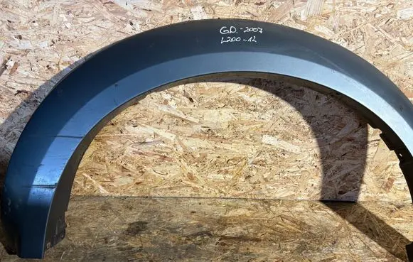 Mitsubishi L200 Rear arch trim MN117444