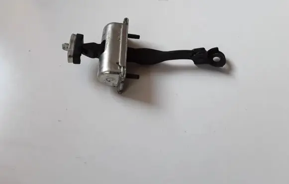 Front door check strap stopper