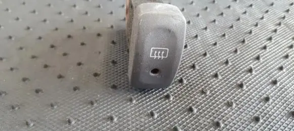 Nissan Micra Windscreen/window heater switch 065251