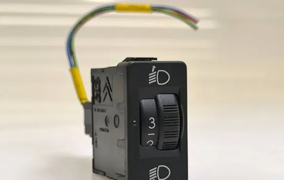 Headlight level height control switch