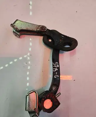 Rear door check strap stopper