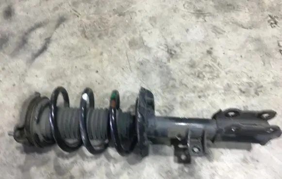 Hyundai Tucson TL Front shock absorber with coil spring 54650D7520