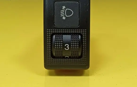 Mazda Demio Headlight level height control switch DC36