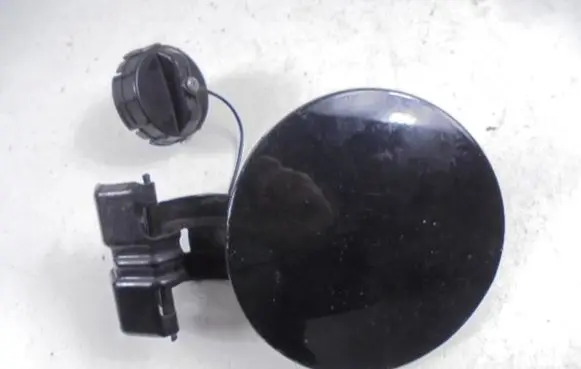 Mitsubishi Lancer VIII Fuel tank cap trim 