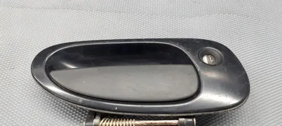 Mazda 323 Front door exterior handle