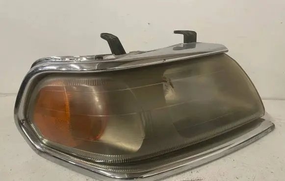 Mitsubishi Pajero Sport I Headlight/headlamp