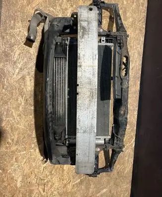 Radiator support slam panel
