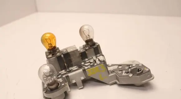 Volvo V50 Tail light bulb cover holder 