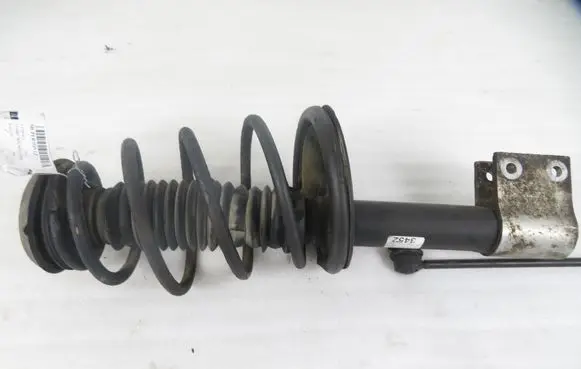 Citroen C4 I Front shock absorber with coil spring