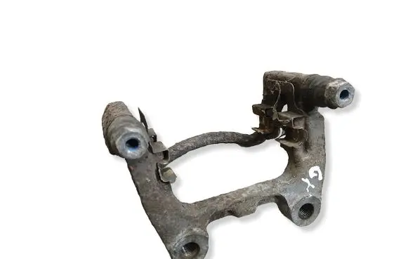 Volkswagen PASSAT B6 Brake caliper pad carrier rear 