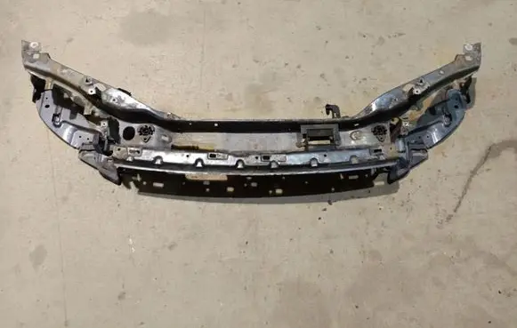 Radiator support slam panel