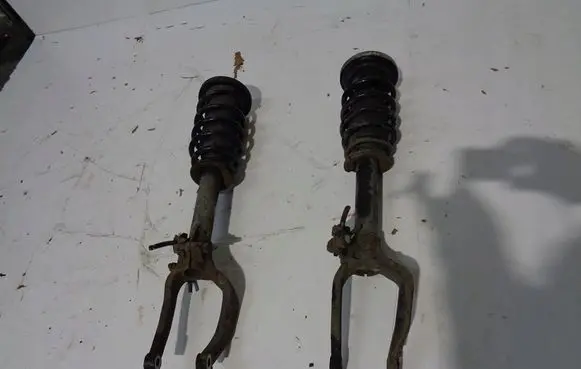 Alfa Romeo 159 Front shock absorber with coil spring MCPERSON