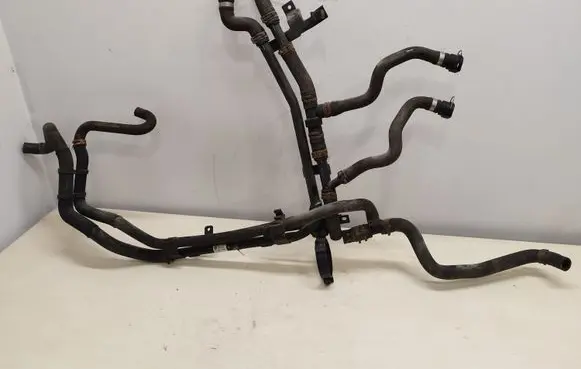 Volkswagen Touareg II Engine coolant pipe/hose 7P0121070AB 7P6122109F 7P0122051D