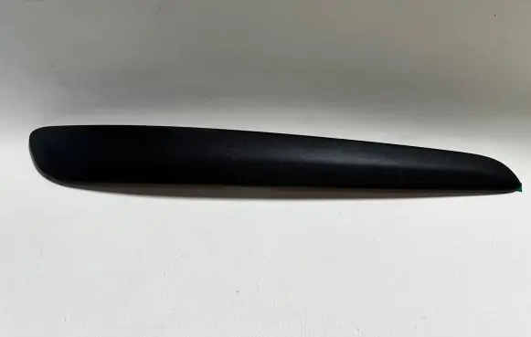 Rear bumper trim bar molding