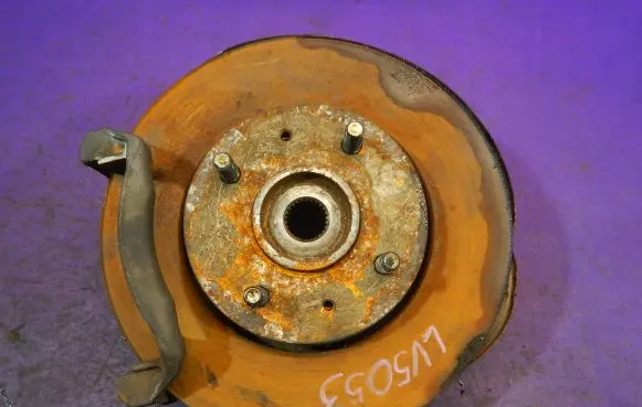 Front wheel hub spindle knuckle